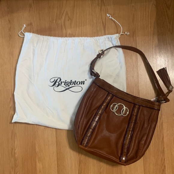 Brighton
Shoulder Bag Brown Leather Satchel
11"L x 3.5"W x 12"H - Picture 7 of 7